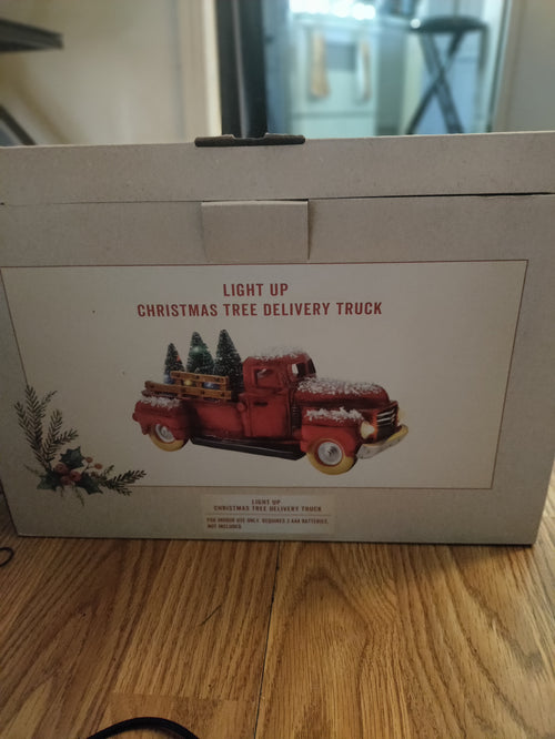 Light up Christmas tree delivery truck